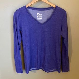Used, good condition Women’s Medium Nike Dri-Fit Athletic Cut V-Neck Shirt.